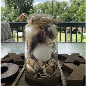 Homemade wicker seashell jars